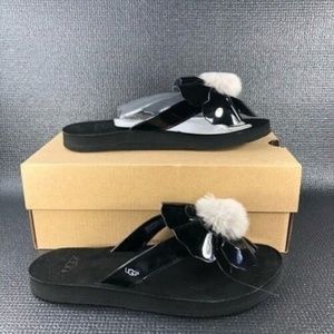 NIB NEW UGG Womens Sandals Black Patent Poppy Fur Logo Pom Pom Flower Flip Flops